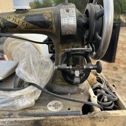 antique White Family Rotary sewing machine from the early 20th century. 