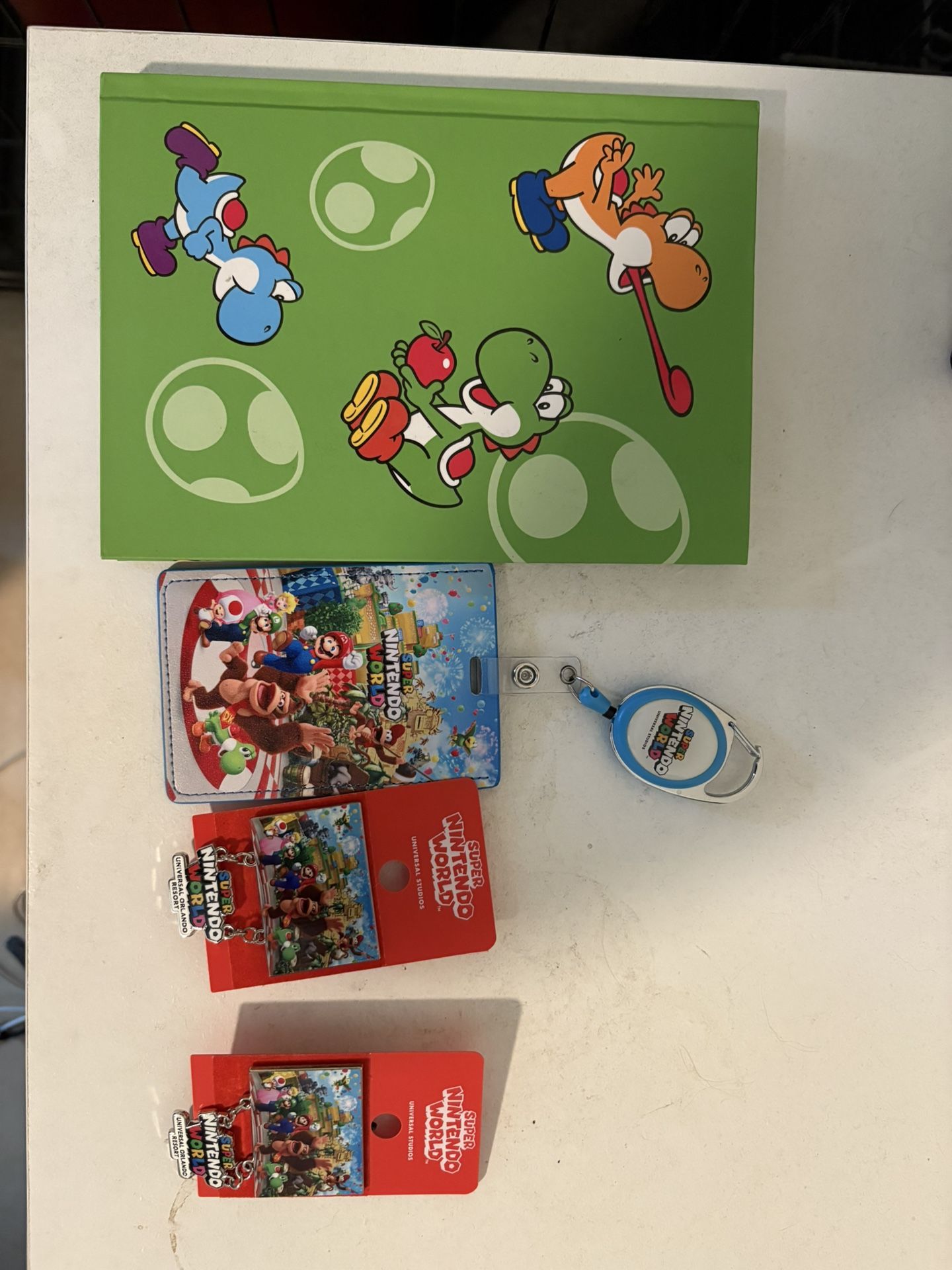 Universal Studios Epic Universal Nintendo Pins, Planner And Badge Holder