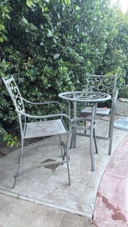 Patio furniture table, chairs and high top table no top.