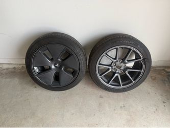 235/45/18 Tesla rim/tire