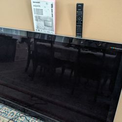 60 inch Sharp Aquos LCD Smart TV with wall mount