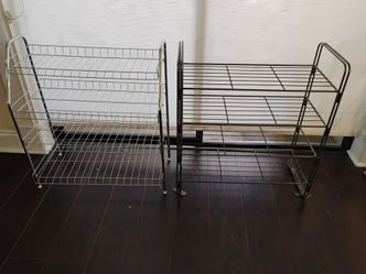 Two metal shoe racks