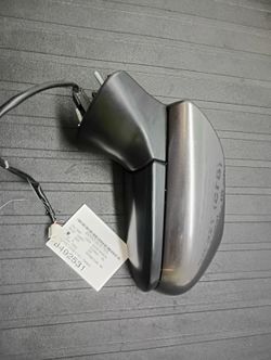 Grey Camry LE driver side mirror
