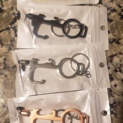 No touch door, bottle opener. stylus and keychain