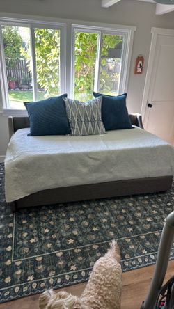 Day bed- grey- upholstered - linens not included. Mattresses included