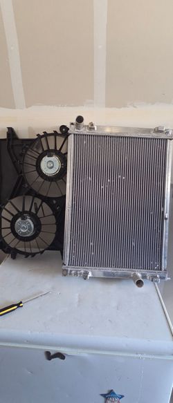 Radiator and dual radiator fan assembly