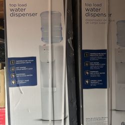 Top Load Water Dispenser. Hot And Cold Water