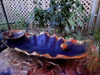 Cobalt blue and gold banana leaf birdbath
