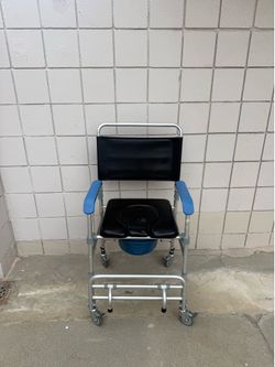 Toilet chair with wheels.  Almost new.