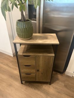 Compact storage cabinet