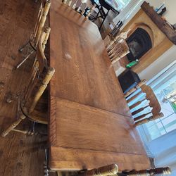 Wood extendable table, 6 chairs, and table pad