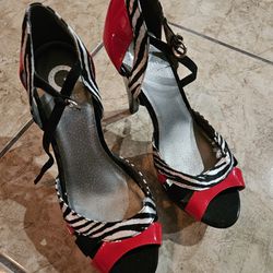 Women's black and red Guess high heels.