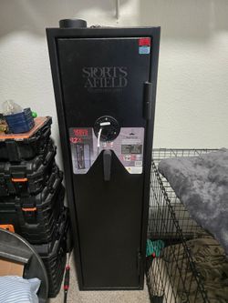 Sportsafield 12 gun case with keys and electronic lock.