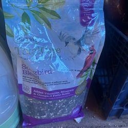 Two bags of bird food $10 for all