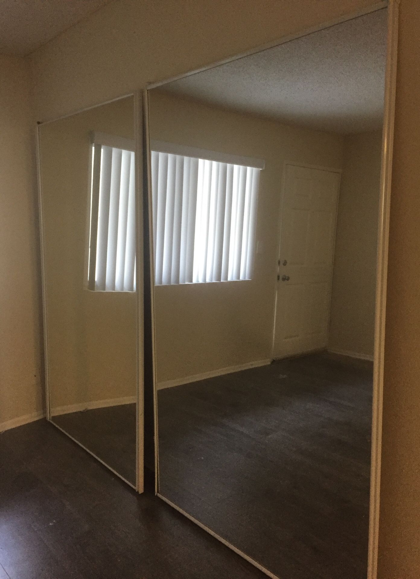 Mirrored closet doors with minimal wear!