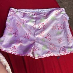 Pink shorts with fans. Size medium 