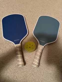 Recess Pickleball Paddles Set - 2 Paddles, 4 Pickle Balls - Lightweight, Sturdy Construction - Sweat Resistant Comfort Grip - Premium Performance - Id