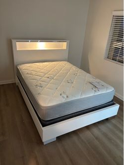 Queen size bed frame with mattress