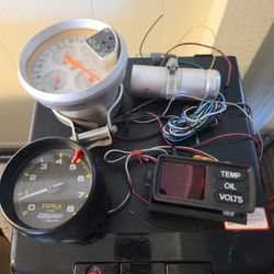 two Tachometer And Brand Gage For Oil Temp  Alt
