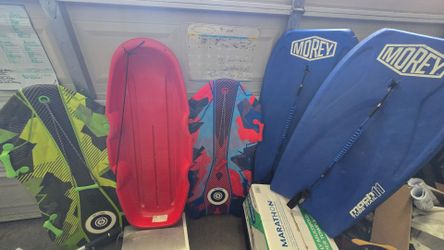 Used snow sled sledding and boogie board