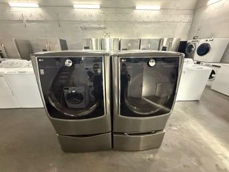 LG Washer and Dryer On Pedestals ( Pedestal is a washer also)