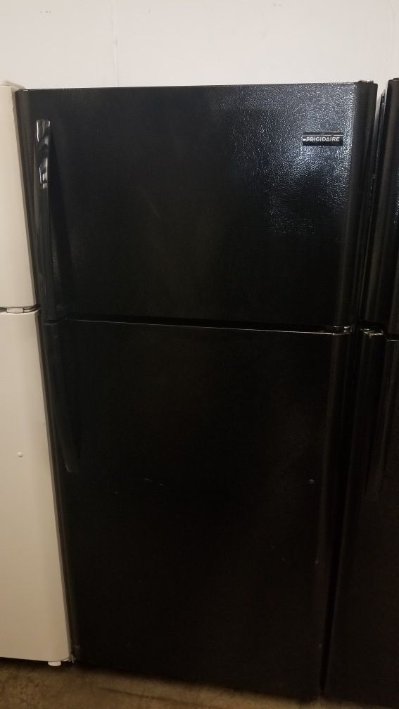 New Frigidaire top freezer refrigerator black with ice maker