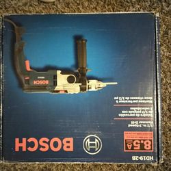 Bosch 1/2 in. 2 Speed Hammer Drill. Top of the line hammer drill brand new never used. Rebuildable if ever needed....
