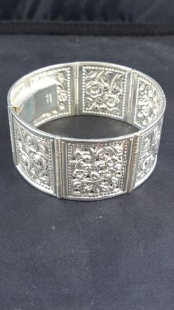 Hand carved silver bangle bracelet