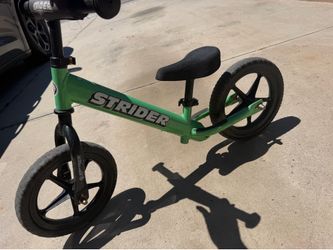 green strider balance bike