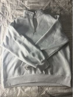 Light gray let quarter zip.