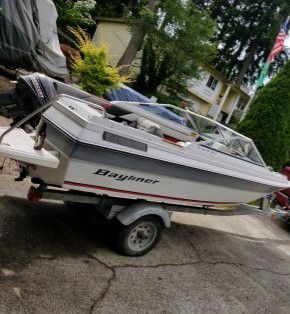 Bayliner, Capri. 16ft 8hp 2 stroke outboard motor. And the trailer
