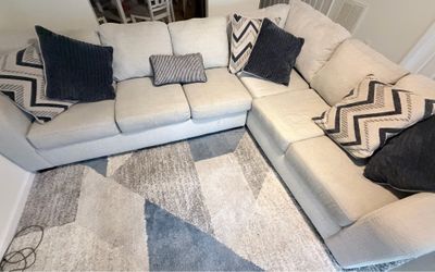 L shape light gray couch
