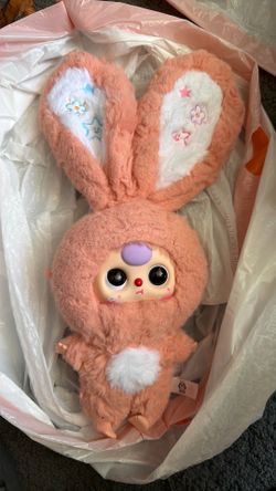 Baby Three Lily Rabbit Town V3 series plush doll featuring a fluffy peach suit with embroidered star details on the ears.$10