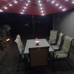 Patio Table And 6 Chairs And Liht  Umbrella 