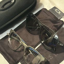 2 Pair Of Oakley Glasses