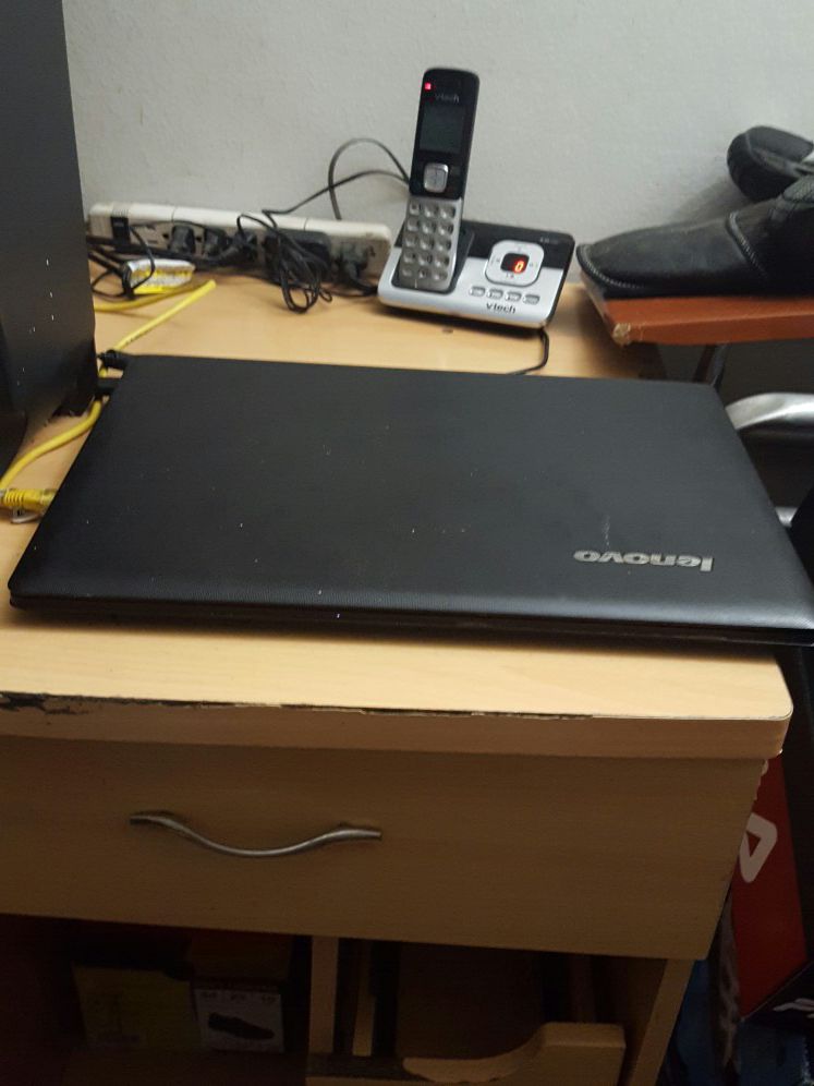 A black Lenovo Windows 10 laptop