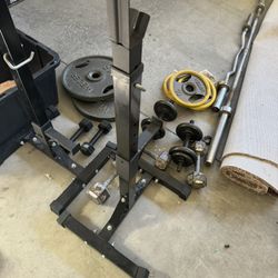 Weight Rack & Metal plates & Dumbbells 