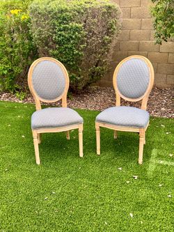 Pair of French country oval dining chairs