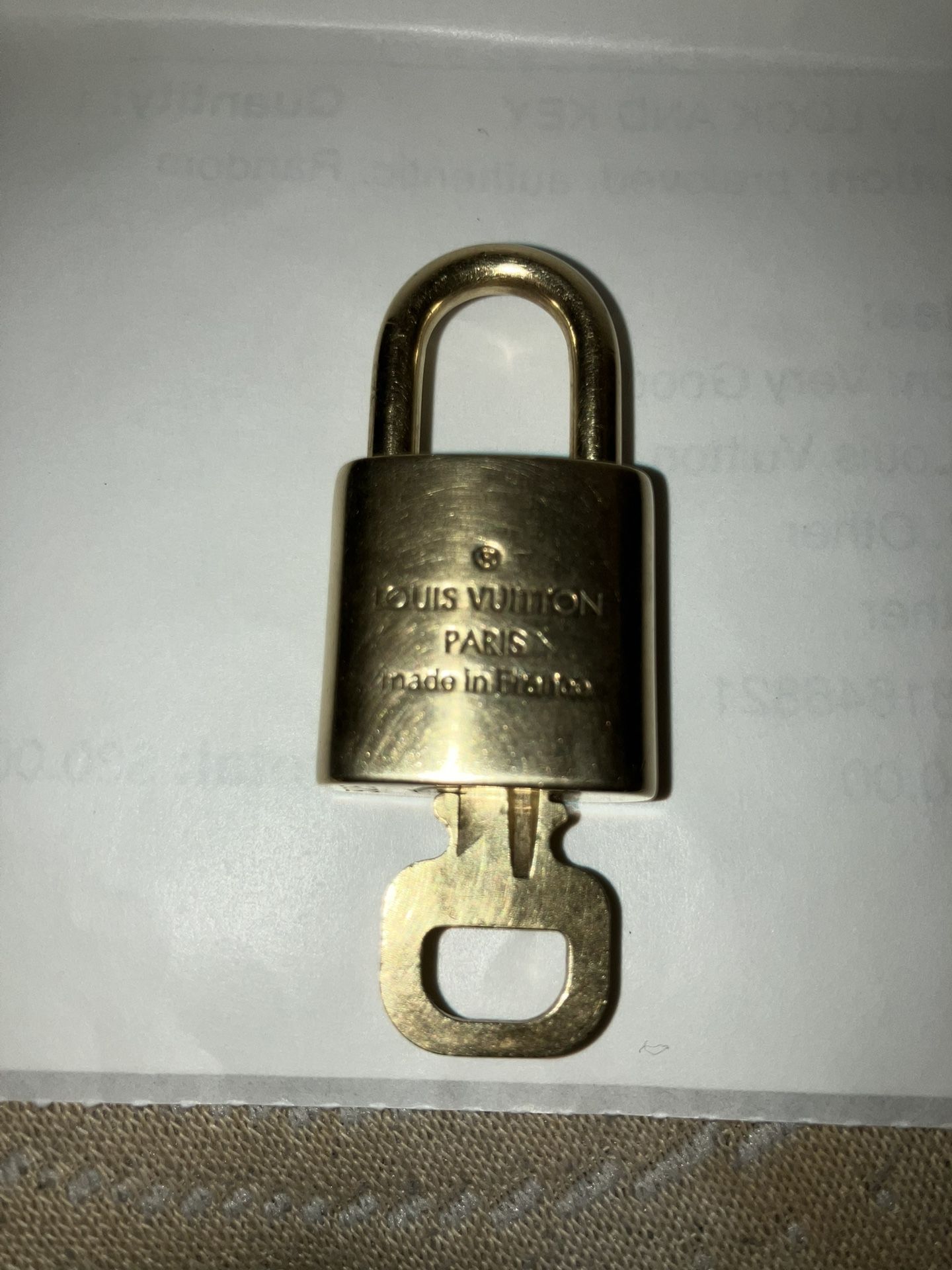 L.V. INDIVIDUALLY NUMBERED LOCK AND KEY!