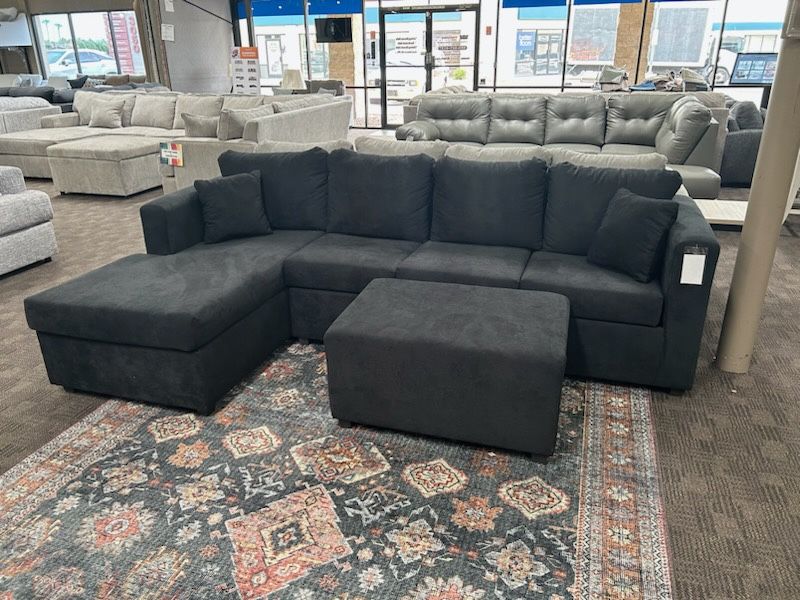 New Black Sectional And Ottoman