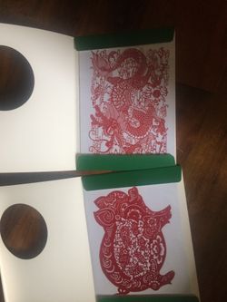 Chinese paper cut out art - pig and dragon