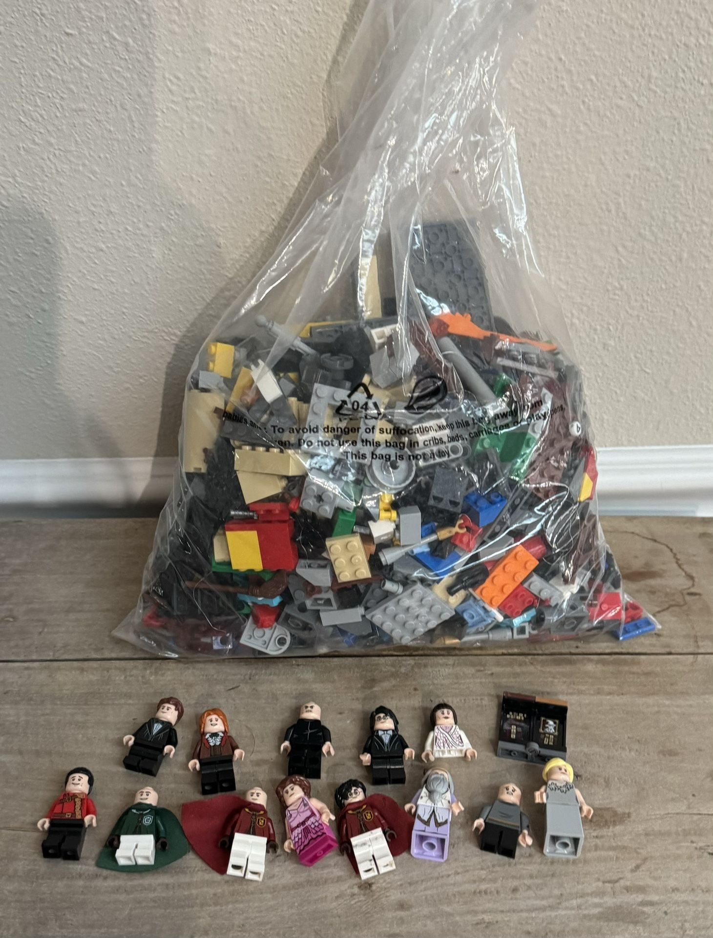 Lego Pieces and Mini Figures Harry Potter about 3 pounds $30 for All xox