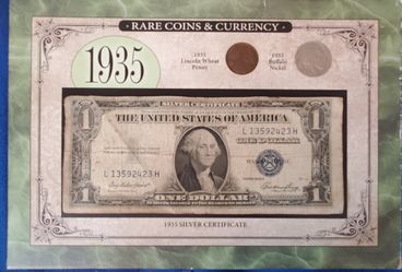 1935 silver Certificate, wheat penny, and buffalo nickle
