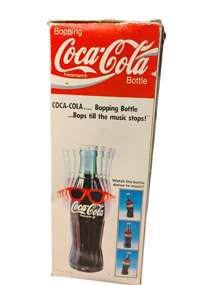Vintage Coca Cola Dancing Bottle