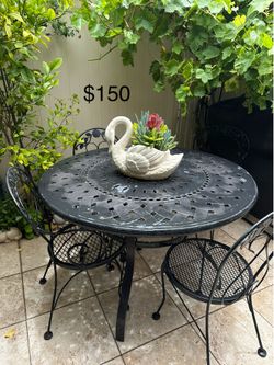 Patio furniture with table and for chair