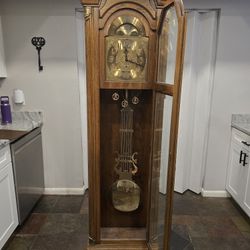 Grand Father's Clock Must Go
