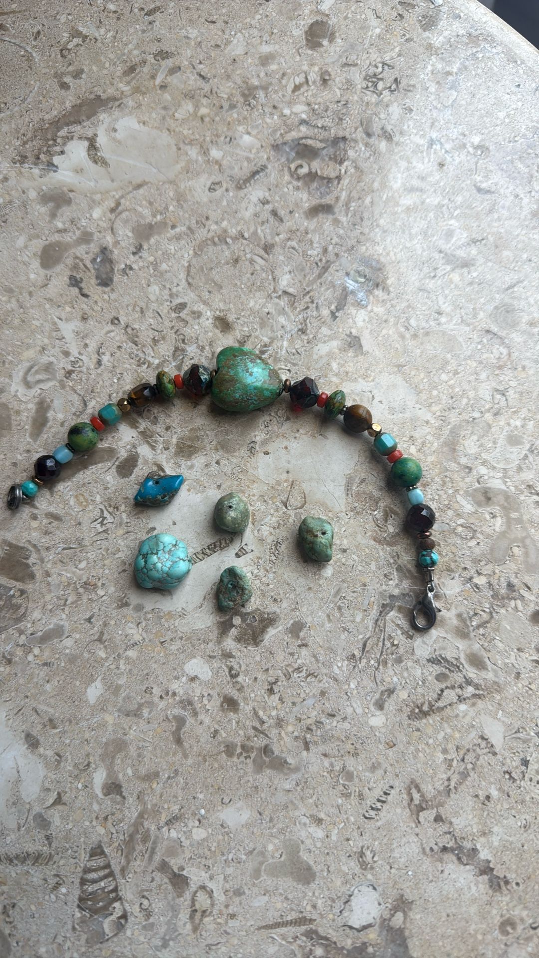 • Woman's Bracelet with 9 turquoise and 2 tigereye stones, @ 5 Inches long