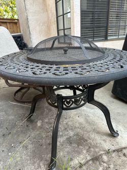 Wrought iron pit plus 4 chairs DEAL