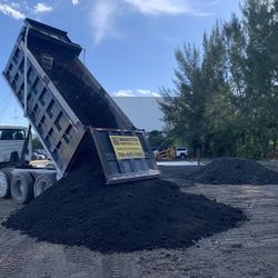 Dump Truck And Skid Steer / Bobcat