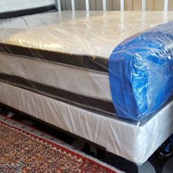 Queen size Pillowtop Mattress and box spring and metal frame.